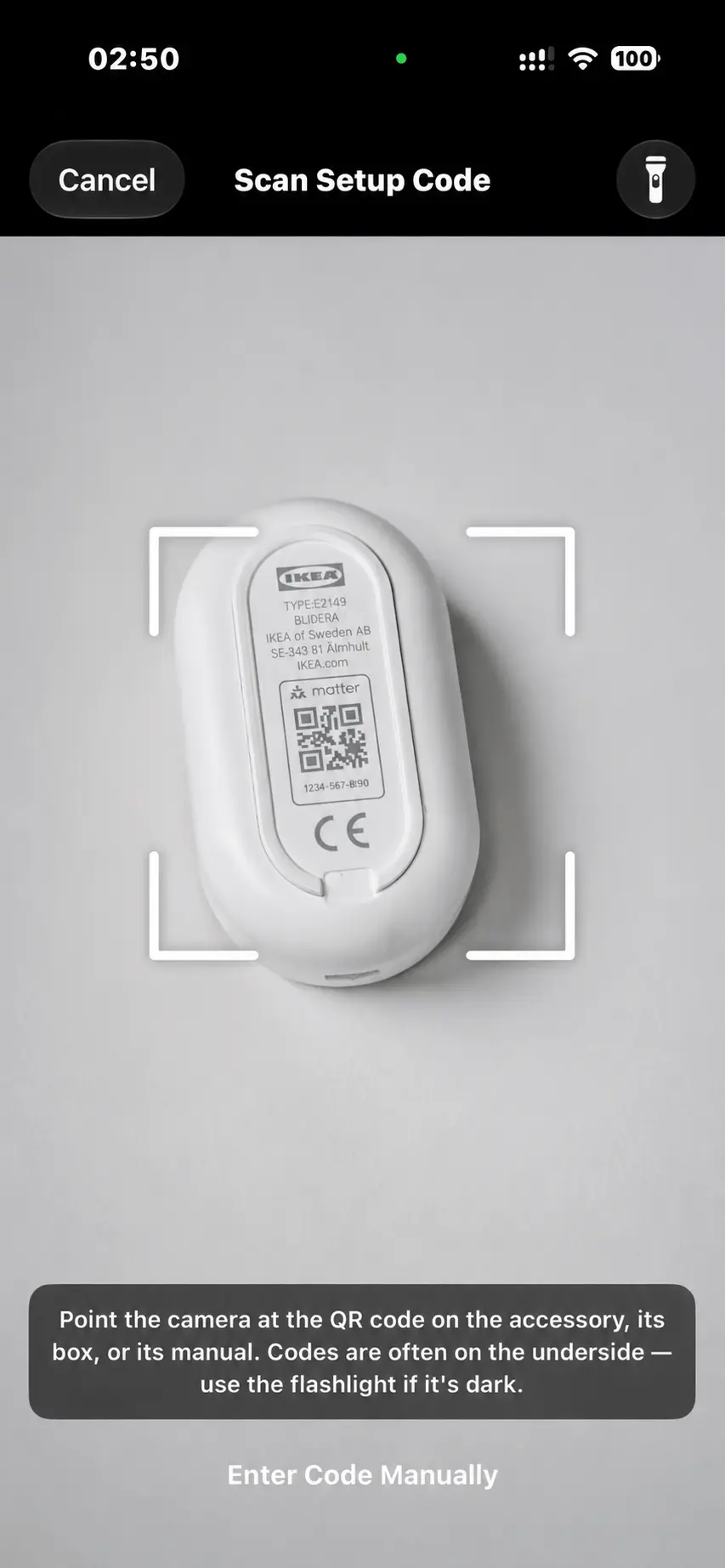 The scanner, reading the QR code printed on an accessory.